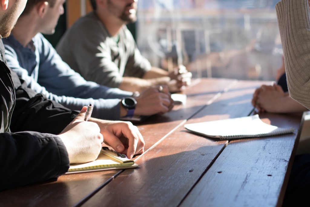 Binfo Group consultants in a planning meeting